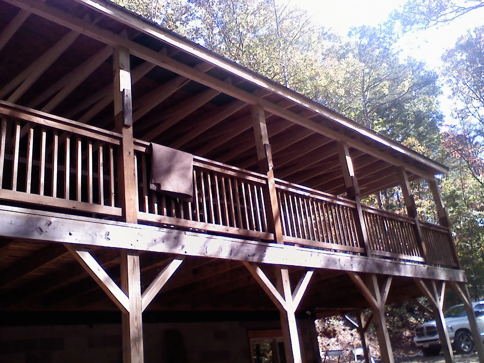 Timber framing under a new elevated porch and deck — Roof Leak Repair in Rockland by Roofing Brothers